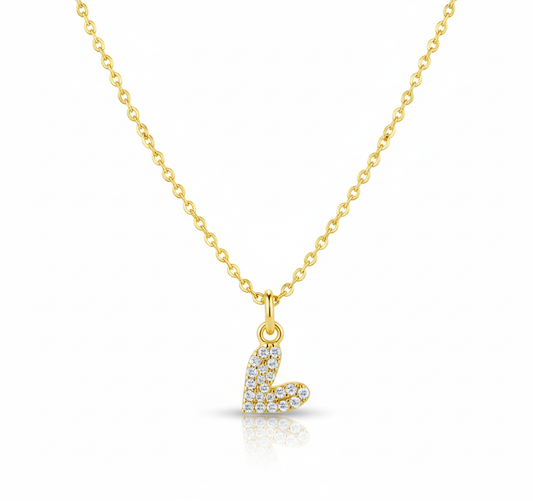 Gold necklace with a heart pendant on a white background